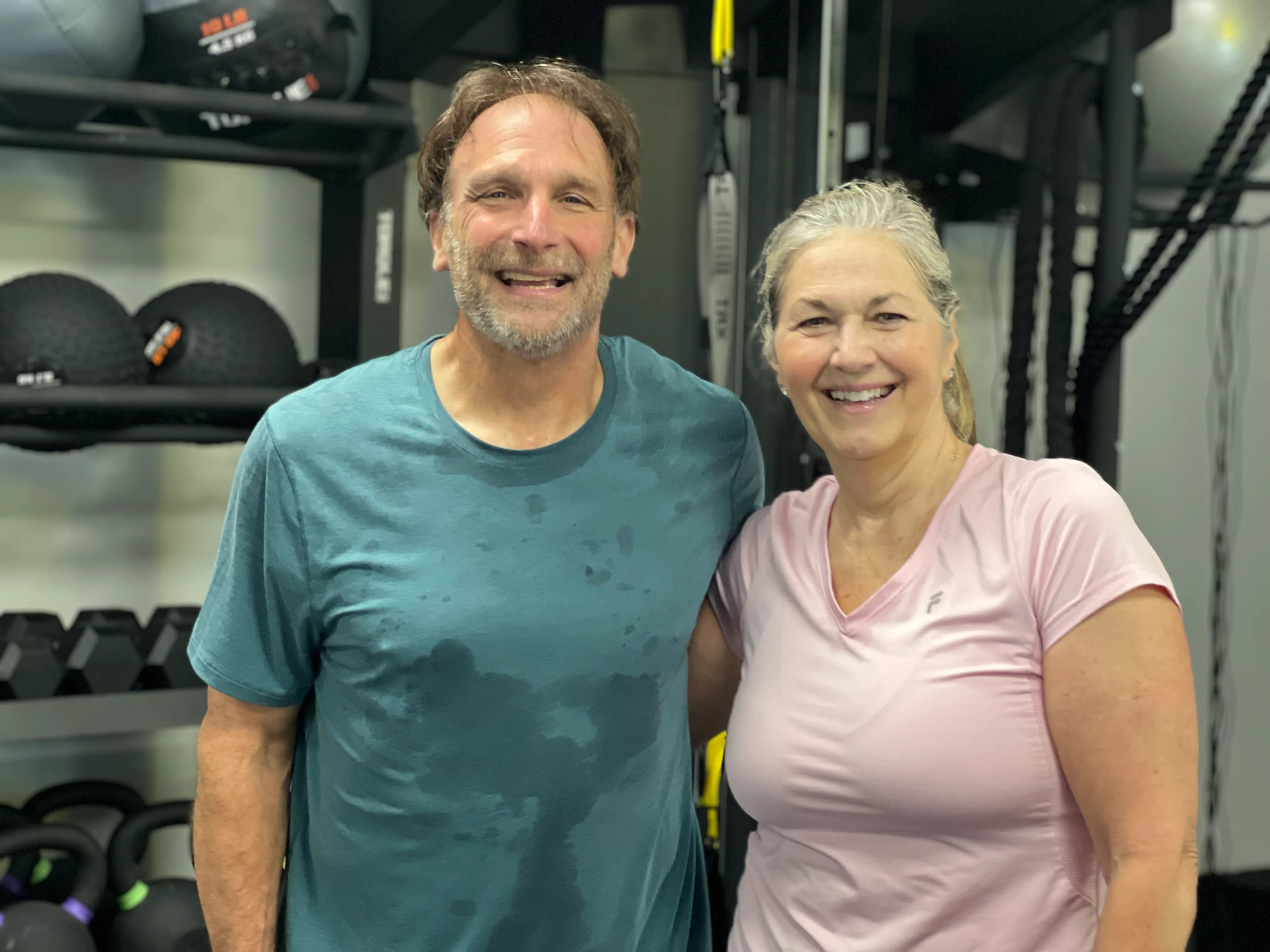 Couple smiling after small group training at Next Gen Harding